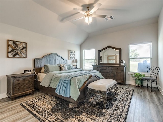 2315 Dixie Dr, Blanchard, OK 73010 - bedroom featuring wood finished floors, vaulted ceiling, and ceiling fan