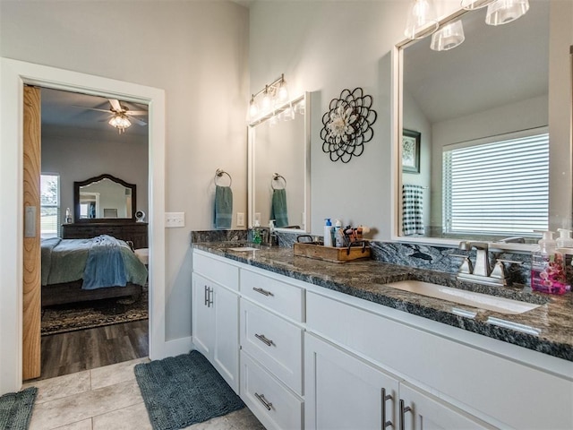 2315 Dixie Dr, Blanchard, OK 73010 - ensuite bathroom with double vanity, tile patterned floors, and ceiling fan