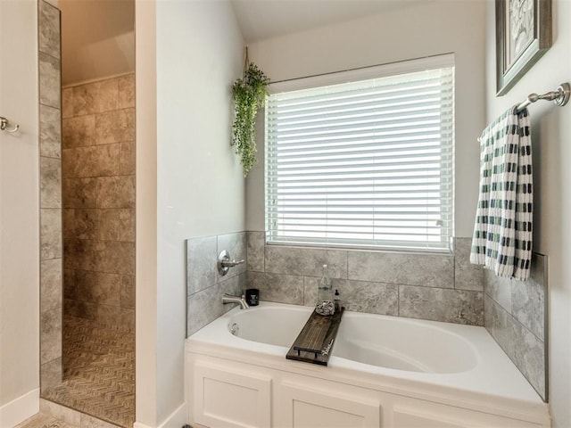 2315 Dixie Dr, Blanchard, OK 73010 - bathroom featuring a garden tub and tiled shower
