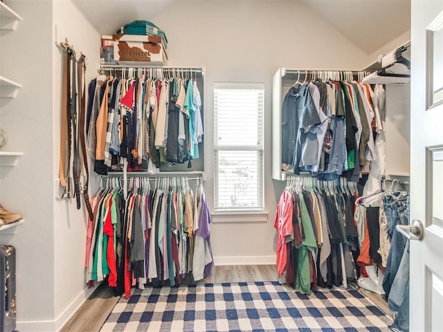 2315 Dixie Dr, Blanchard, OK 73010 - spacious closet featuring vaulted ceiling and wood finished floors