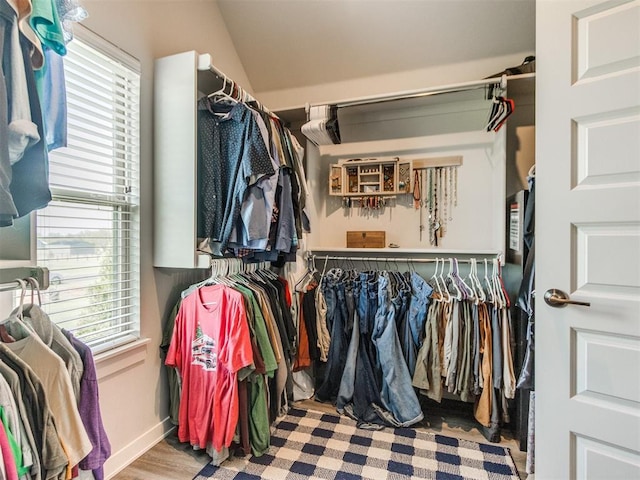 2315 Dixie Dr, Blanchard, OK 73010 - walk in closet with wood finished floors and vaulted ceiling