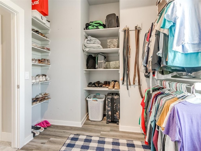 2315 Dixie Dr, Blanchard, OK 73010 - walk in closet featuring wood finished floors