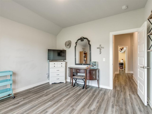 2315 Dixie Dr, Blanchard, OK 73010 - bedroom featuring wood finished floors and lofted ceiling
