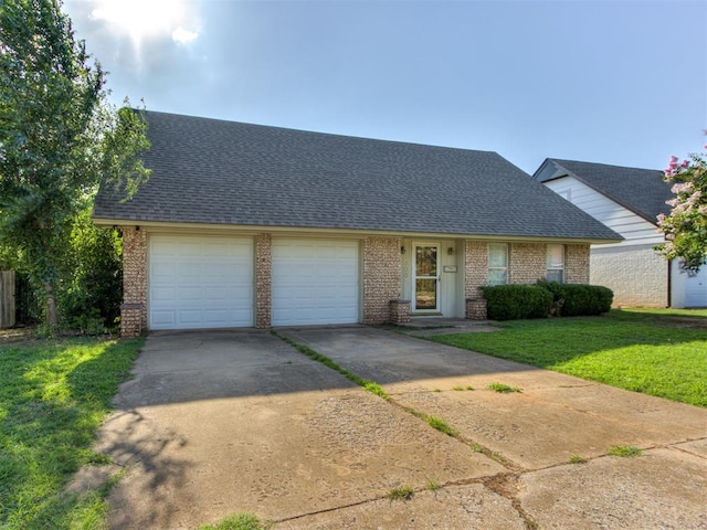 1800 Michael Dr, Edmond, OK 73013 - view of front of property with an attached garage, driveway, brick siding, and a front lawn