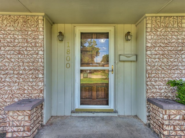 1800 Michael Dr, Edmond, OK 73013 - view of exterior entry with a porch