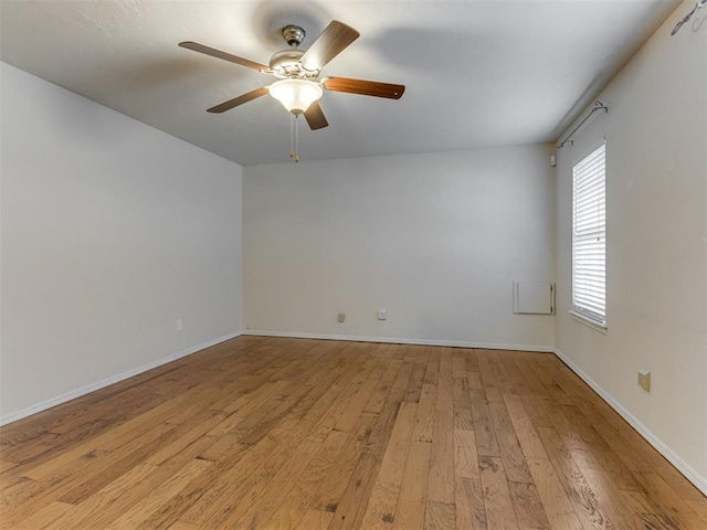 1800 Michael Dr, Edmond, OK 73013 - unfurnished room with light wood-style flooring and ceiling fan