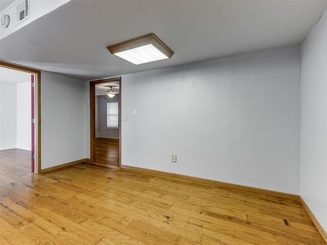 1800 Michael Dr, Edmond, OK 73013 - unfurnished room with light wood finished floors and ceiling fan