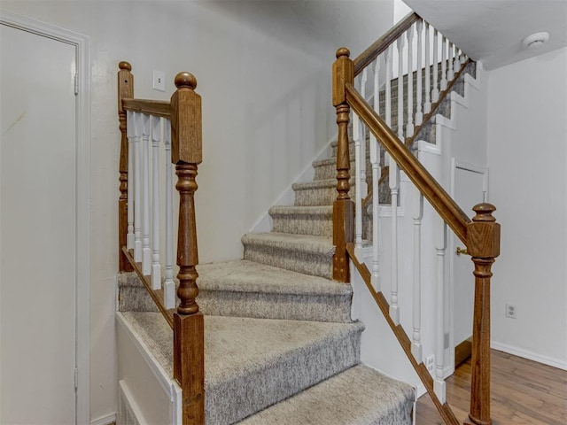 1800 Michael Dr, Edmond, OK 73013 - stairs featuring wood finished floors and baseboards