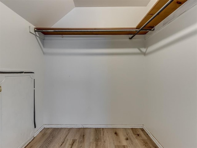 1800 Michael Dr, Edmond, OK 73013 - walk in closet featuring light wood finished floors