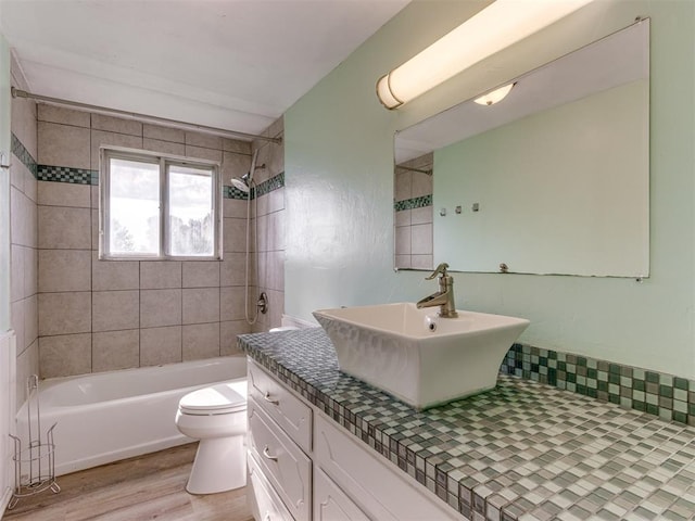 1800 Michael Dr, Edmond, OK 73013 - bathroom with vanity, wood finished floors, and shower / tub combination