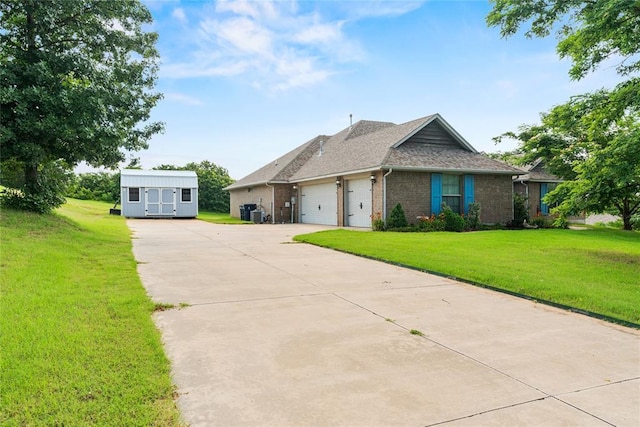 7324 Ridge Manor Ln, Oklahoma City, OK 73150 - view of front of home with concrete driveway, an attached garage, brick siding, and a front lawn
