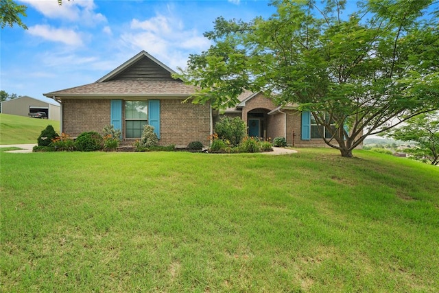 7324 Ridge Manor Ln, Oklahoma City, OK 73150 - ranch-style house with brick siding and a front lawn