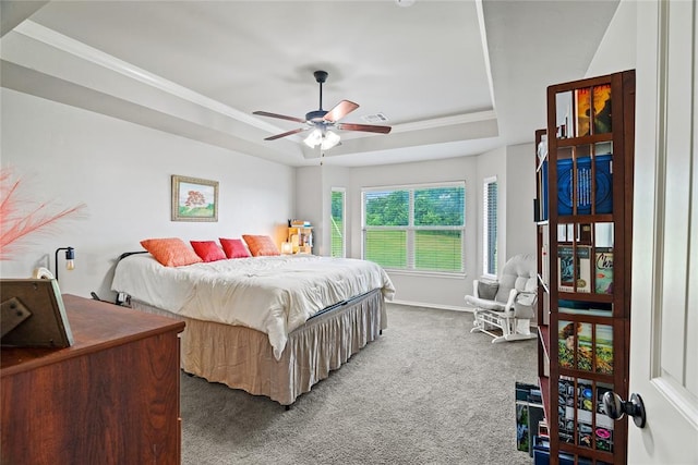7324 Ridge Manor Ln, Oklahoma City, OK 73150 - bedroom with a raised ceiling, carpet floors, crown molding, and ceiling fan