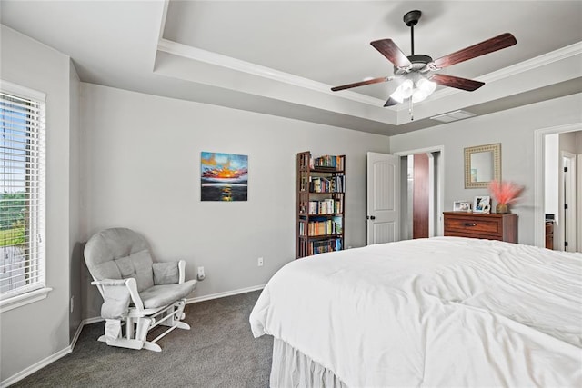 7324 Ridge Manor Ln, Oklahoma City, OK 73150 - carpeted bedroom with crown molding, ceiling fan, and a tray ceiling