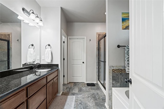 7324 Ridge Manor Ln, Oklahoma City, OK 73150 - full bathroom featuring a shower stall, vanity, a garden tub, and stone finish floors