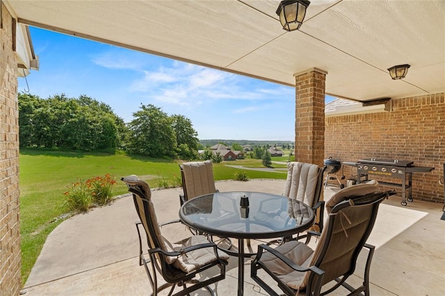 7324 Ridge Manor Ln, Oklahoma City, OK 73150 - view of patio featuring outdoor dining area and area for grilling