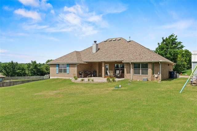 7324 Ridge Manor Ln, Oklahoma City, OK 73150 - rear view of house with a patio, brick siding, a chimney, and roof with shingles
