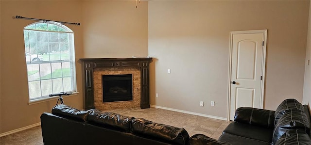 12201 Buckingham Ln, Yukon, OK 73099 - living room with a fireplace and baseboards