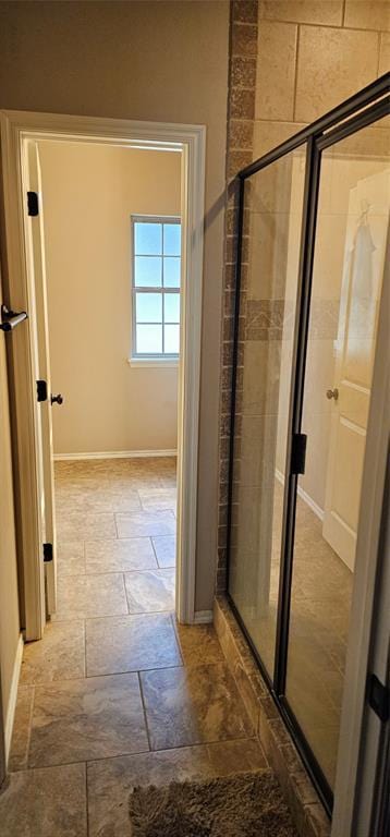 12201 Buckingham Ln, Yukon, OK 73099 - full bath featuring stone tile flooring and a stall shower