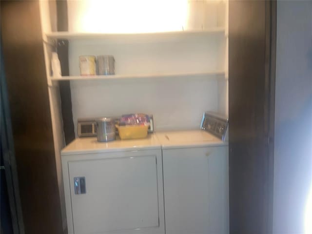 laundry room featuring independent washer and dryer