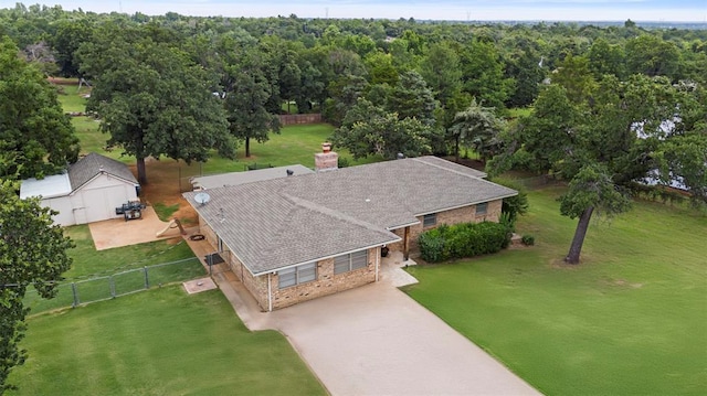 901 E Covell Rd, Edmond, OK 73034 - aerial view of property and surrounding area with a forest