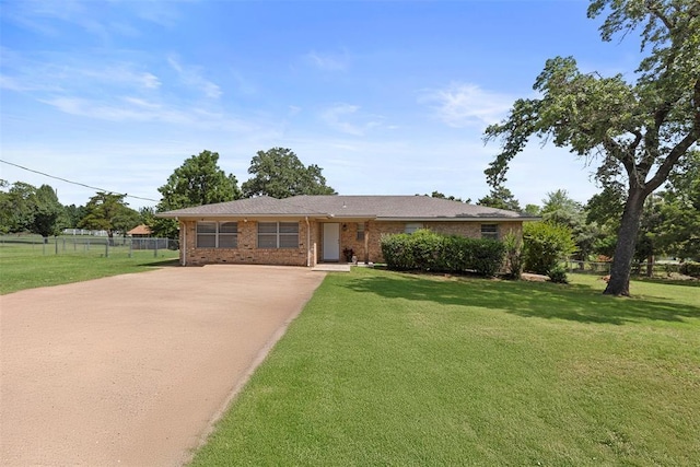 901 E Covell Rd, Edmond, OK 73034 - view of front of home featuring driveway and brick siding
