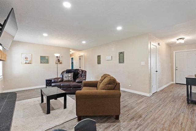 901 E Covell Rd, Edmond, OK 73034 - living room featuring light wood-style floors and recessed lighting