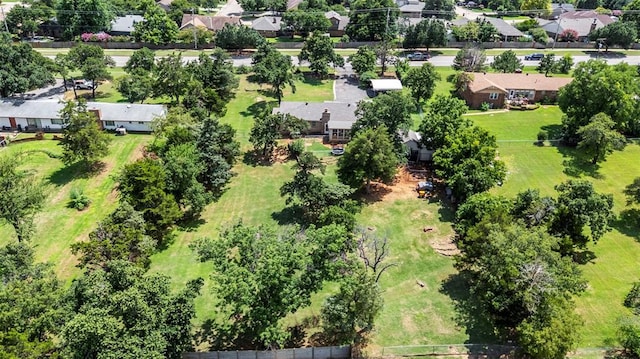 901 E Covell Rd, Edmond, OK 73034 - aerial view of residential area with a tree filled landscape