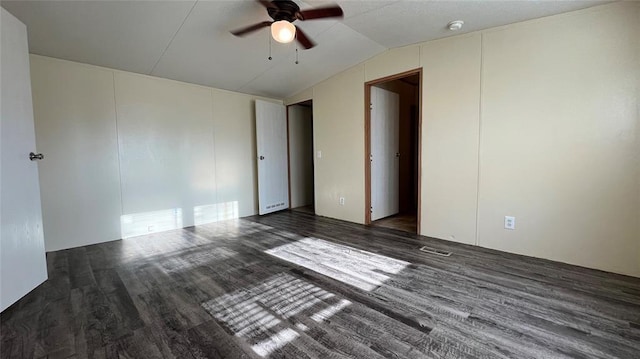 1500 S Pine Cir, Guthrie, OK 73044 - empty room featuring a ceiling fan, vaulted ceiling, and wood finished floors