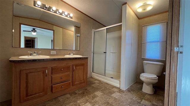 1500 S Pine Cir, Guthrie, OK 73044 - bathroom featuring a shower stall, double vanity, a ceiling fan, vaulted ceiling, and stone finish floors