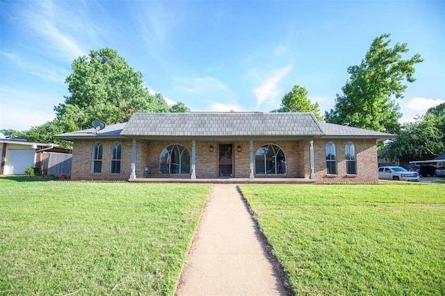 2328 NW 113th St, Oklahoma City, OK 73120 - single story home featuring brick siding, covered porch, and a front yard