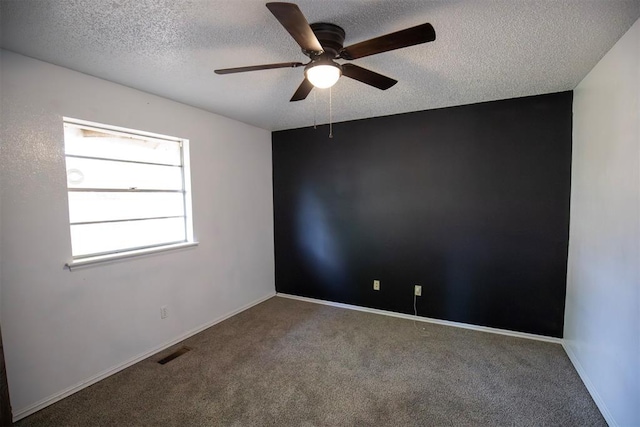 2328 NW 113th St, Oklahoma City, OK 73120 - carpeted empty room with ceiling fan and a textured ceiling
