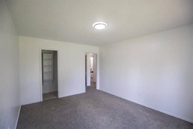 2328 NW 113th St, Oklahoma City, OK 73120 - carpeted spare room featuring a textured ceiling