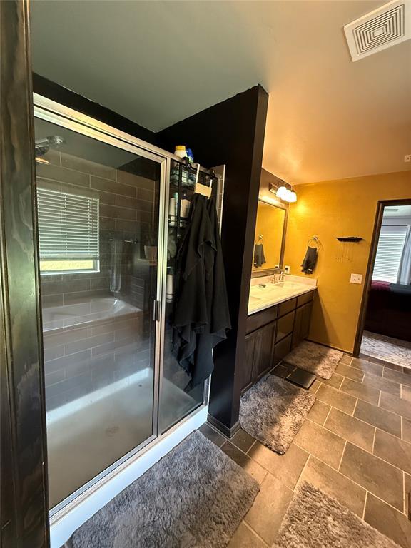 18641 Como Dr, Edmond, OK 73012 - full bath featuring vanity and a stall shower