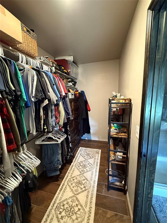 18641 Como Dr, Edmond, OK 73012 - walk in closet featuring tile patterned floors
