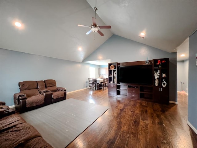 223 SE 53rd St, Oklahoma City, OK 73129 - living area with ceiling fan, wood finished floors, and high vaulted ceiling