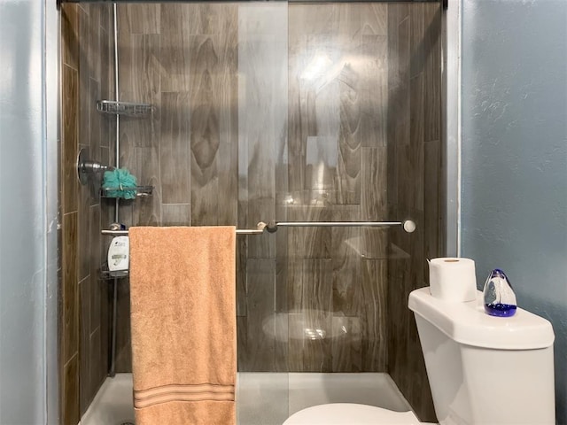 223 SE 53rd St, Oklahoma City, OK 73129 - bathroom with a shower stall and a textured wall