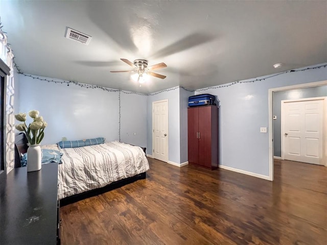 223 SE 53rd St, Oklahoma City, OK 73129 - bedroom with wood finished floors and a ceiling fan