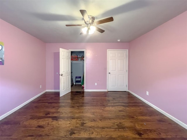 223 SE 53rd St, Oklahoma City, OK 73129 - unfurnished bedroom with dark wood-style flooring and a ceiling fan