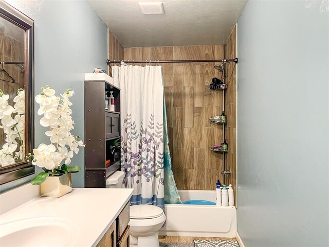 223 SE 53rd St, Oklahoma City, OK 73129 - bathroom with vanity and shower / bath combo with shower curtain