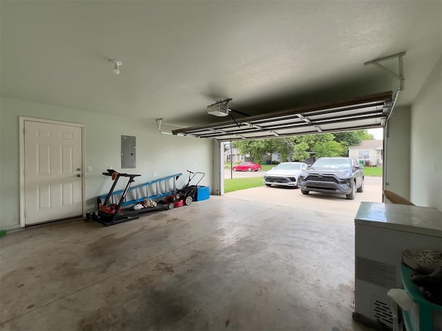 223 SE 53rd St, Oklahoma City, OK 73129 - garage with electric panel and a garage door opener