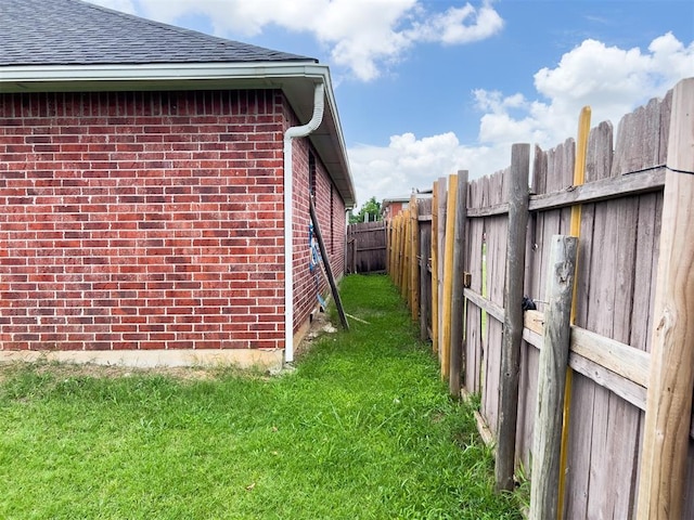223 SE 53rd St, Oklahoma City, OK 73129 - view of side of property with brick siding and a shingled roof