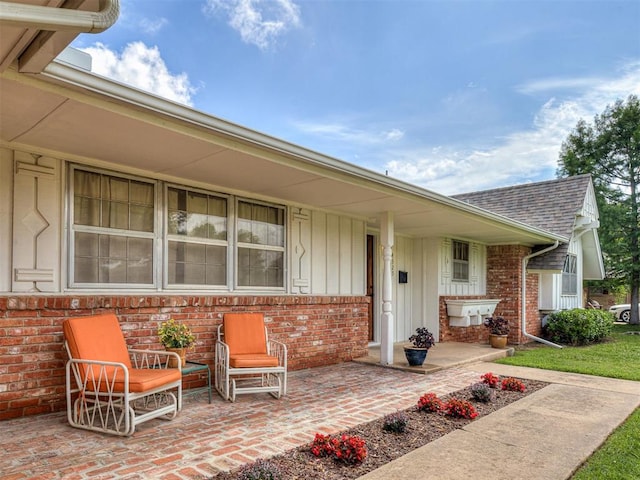 4325 NW 44th St, Oklahoma City, OK 73112 - property entrance with brick siding and roof with shingles