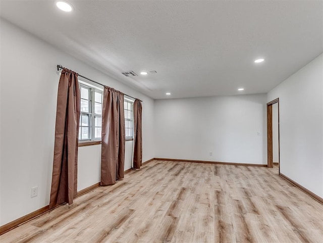 4325 NW 44th St, Oklahoma City, OK 73112 - unfurnished room featuring light wood finished floors and recessed lighting