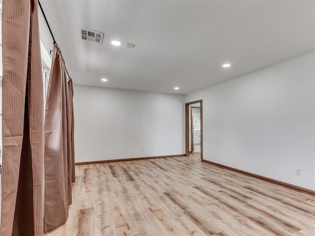 4325 NW 44th St, Oklahoma City, OK 73112 - spare room with light wood finished floors and recessed lighting