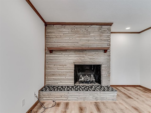 4325 NW 44th St, Oklahoma City, OK 73112 - detailed view of ornamental molding, wood finished floors, and a fireplace