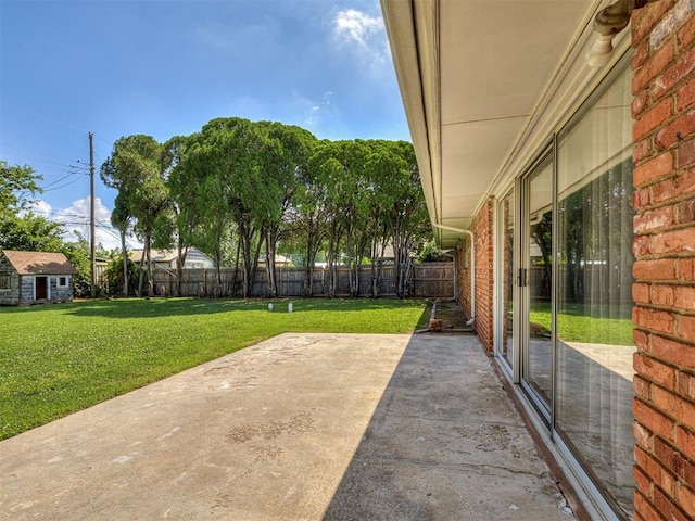 4325 NW 44th St, Oklahoma City, OK 73112 - fenced backyard with a patio area and an outdoor structure