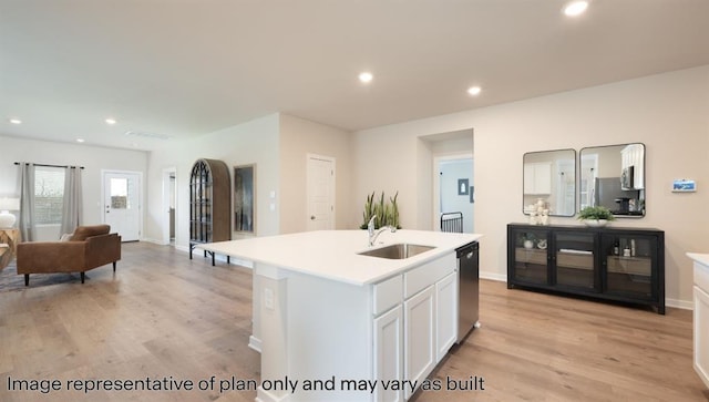 10201 NW 28th Ter, Yukon, OK 73099 - kitchen with dishwasher, light countertops, light wood finished floors, white cabinets, and open floor plan