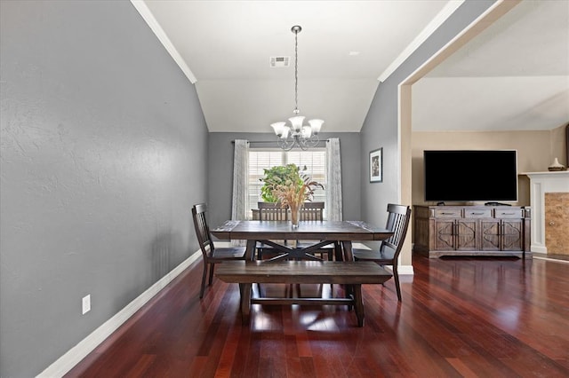 1204 NW 190th Pl, Edmond, OK 73012 - dining space featuring a chandelier, hardwood / wood-style flooring, and lofted ceiling