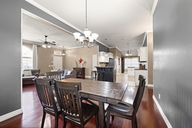 1204 NW 190th Pl, Edmond, OK 73012 - dining space featuring a chandelier, ceiling fan, wood finished floors, and crown molding